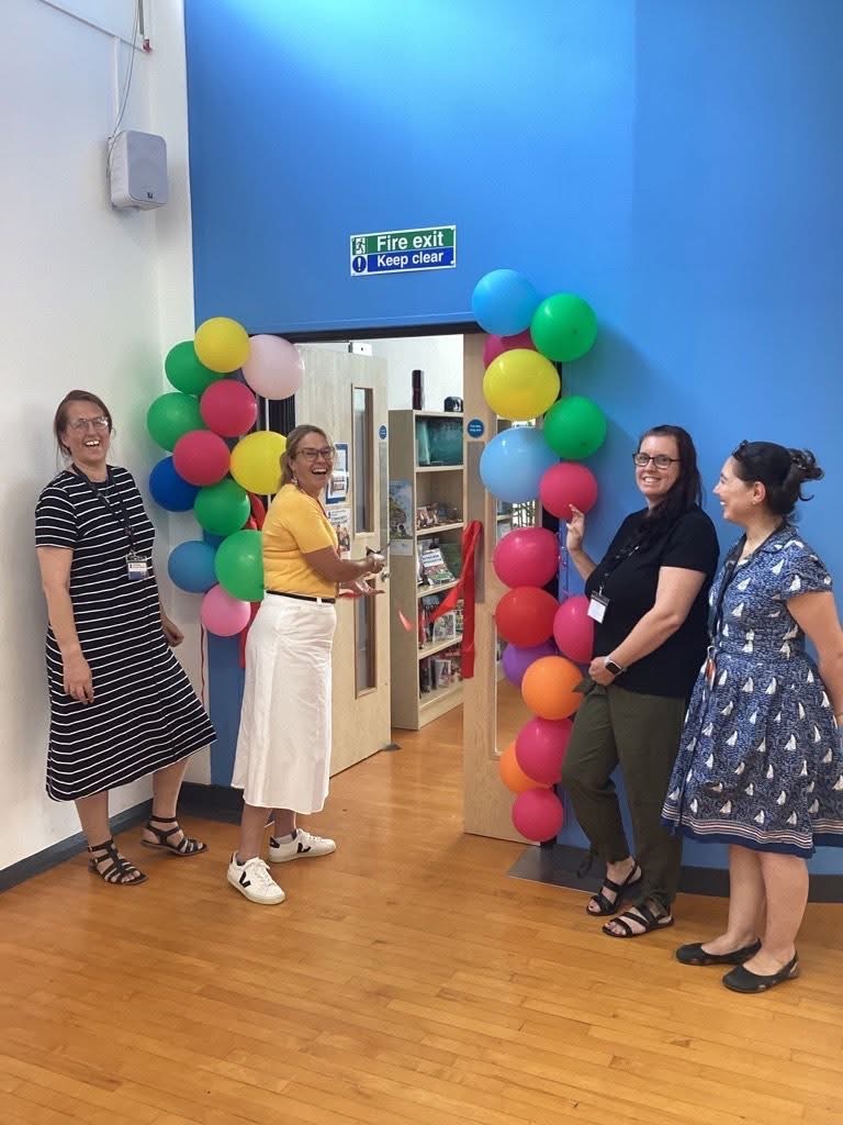 Lexi Rees opening the library and reading cafe